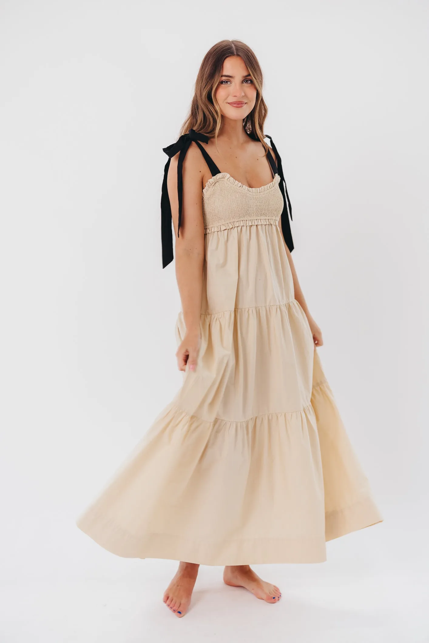 Amber Smocked Maxi Dress with Shoulder Tie in Taupe/Black sold by Worth Collective