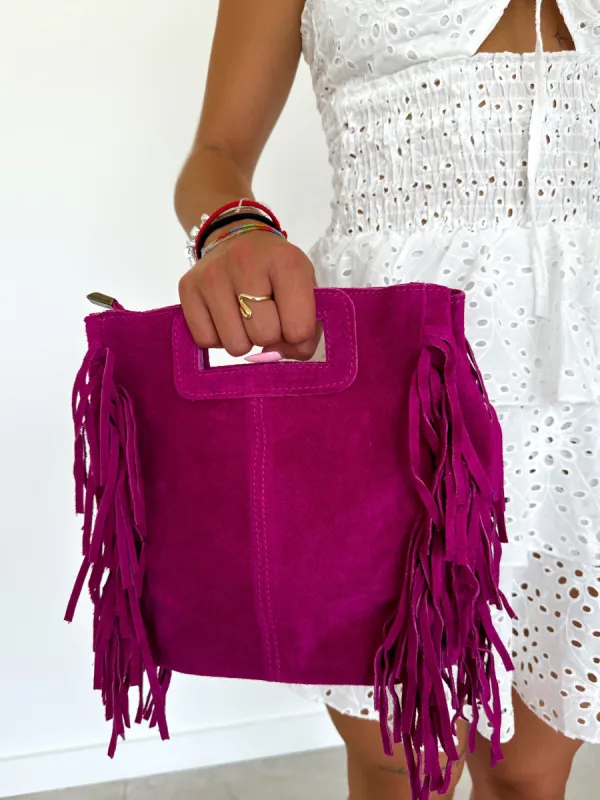 Bolso piel flecos fucsia sold by Sorellas