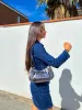 Bolso baguette hebillas plateado sold by Sorellas