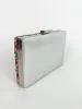 Clutch piedras colores plateado sold by Sorellas