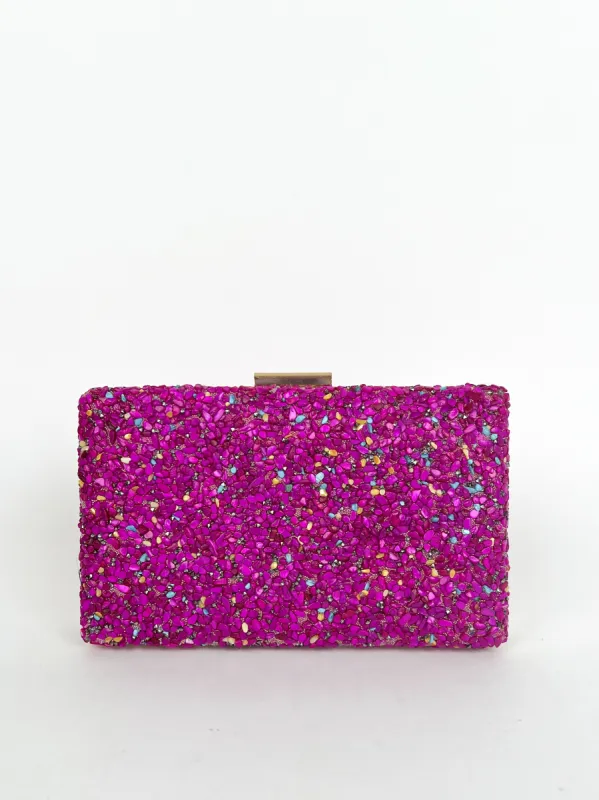 Clutch piedras fucsia sold by Sorellas