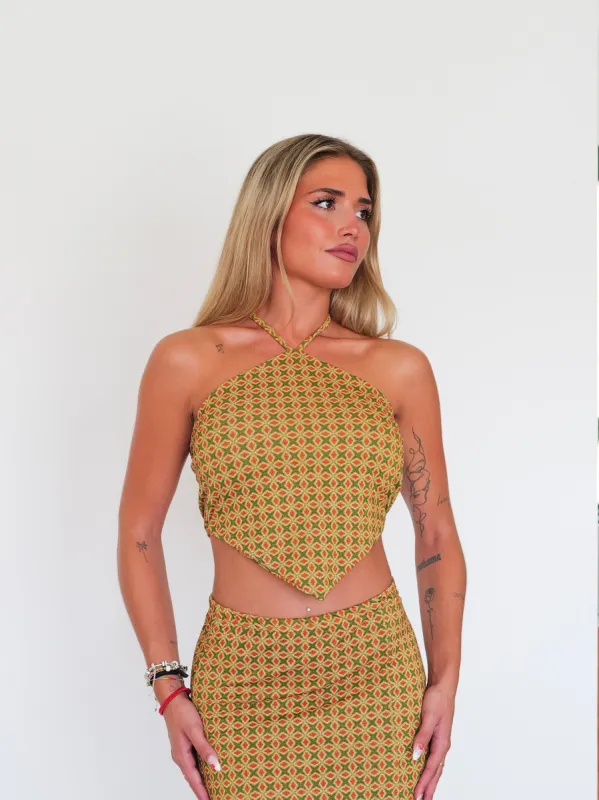 Crop top halter pico estampado mostaza sold by Sorellas