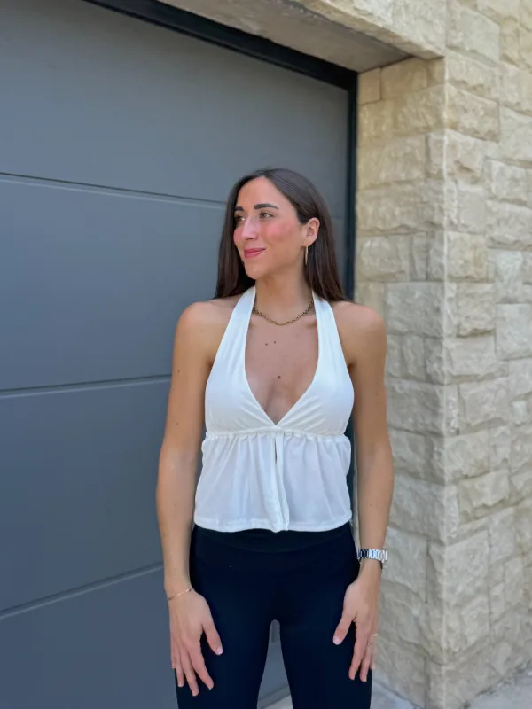 Crop top halter pico abertura blanco sold by Sorellas