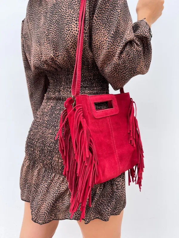 Bolso piel flecos rojo sold by Sorellas