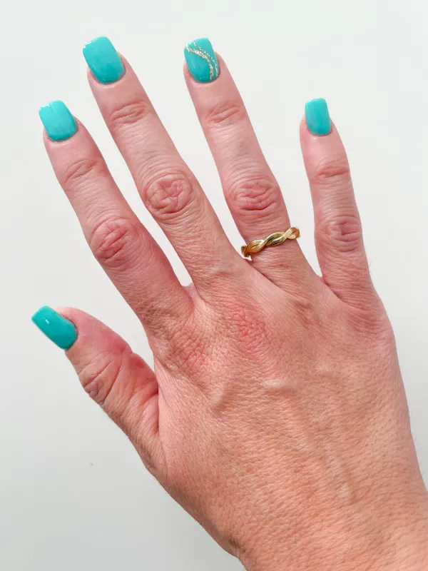 Anillo entrelazado dorado sold by Sorellas