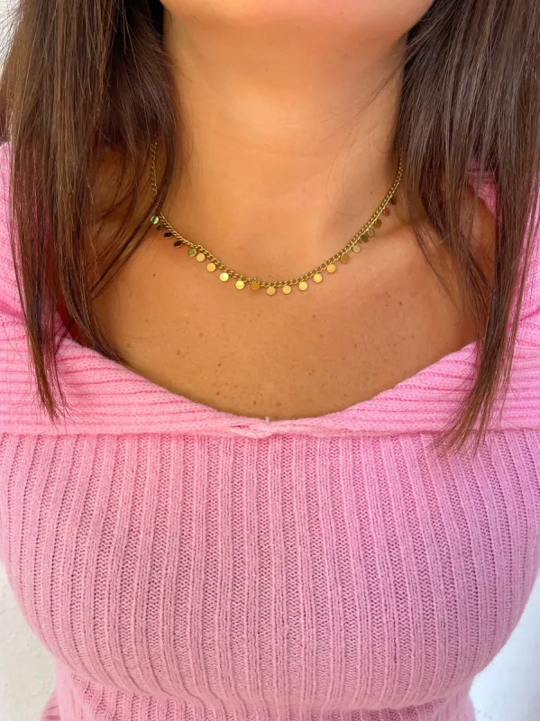 Collar mini esferas doradas sold by Sorellas