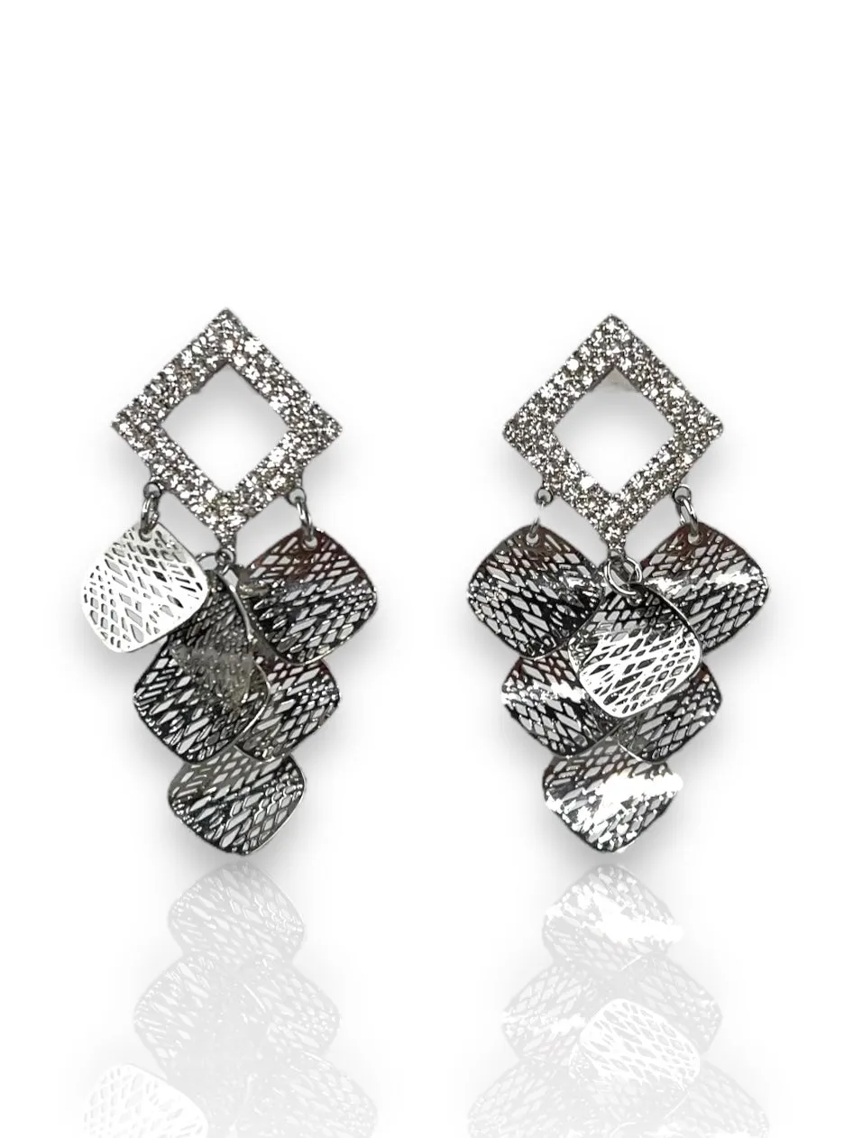 Pendientes rombos plateados sold by Sorellas