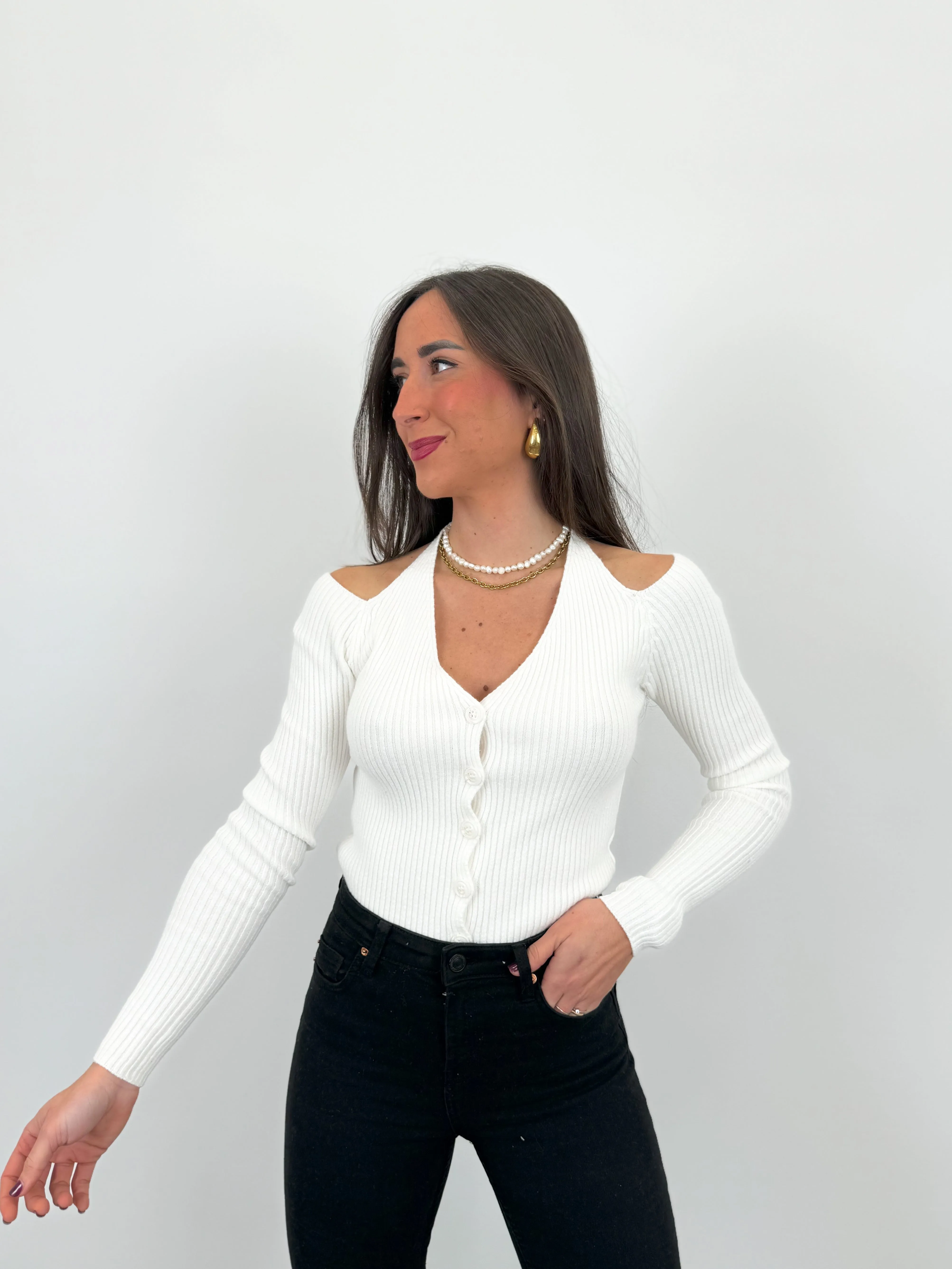 Jersey cruzado botones blanco sold by Sorellas