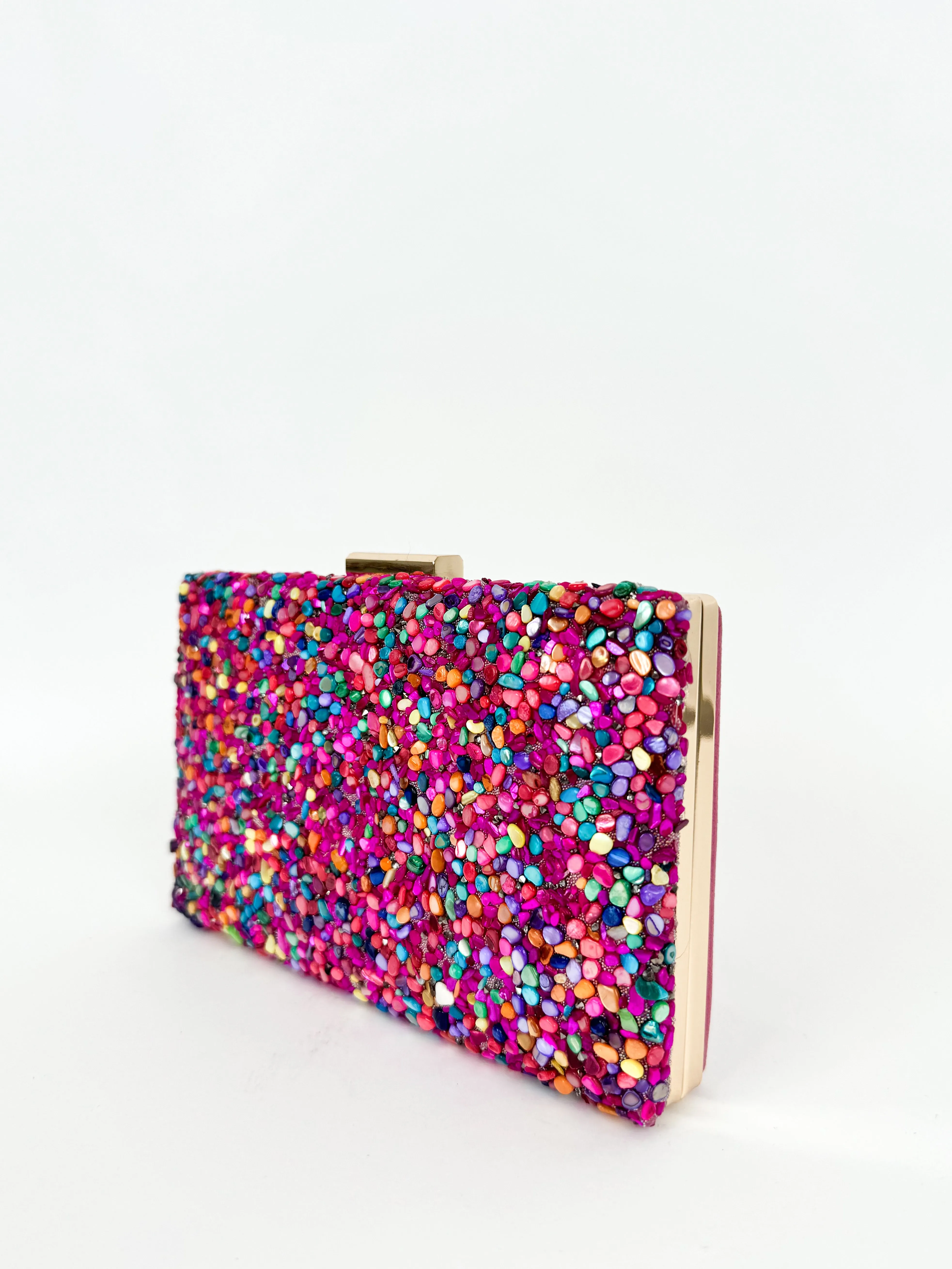 Clutch horizontal piedra fucsia sold by Sorellas