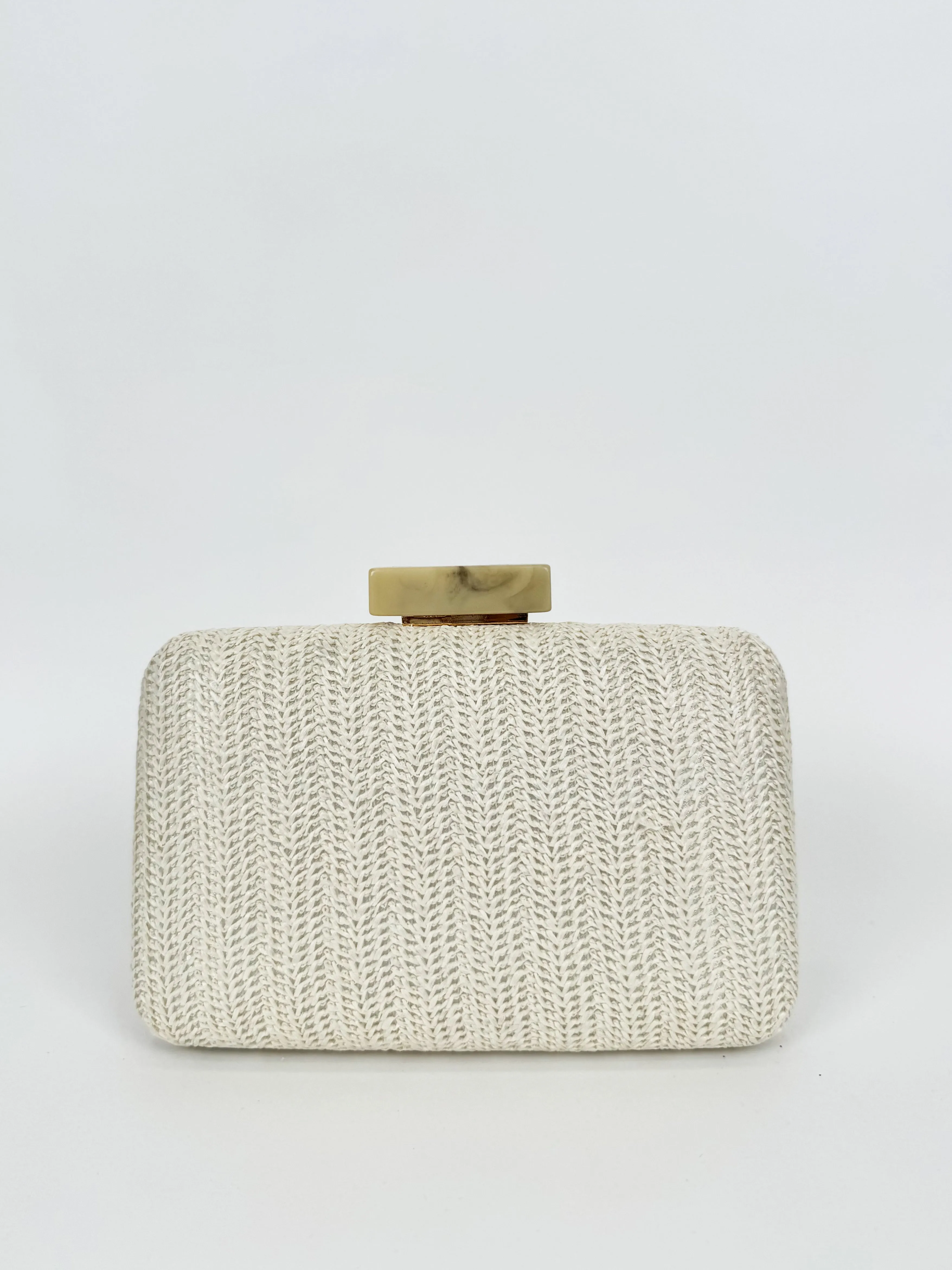 Clutch fiesta rafia beige sold by Sorellas