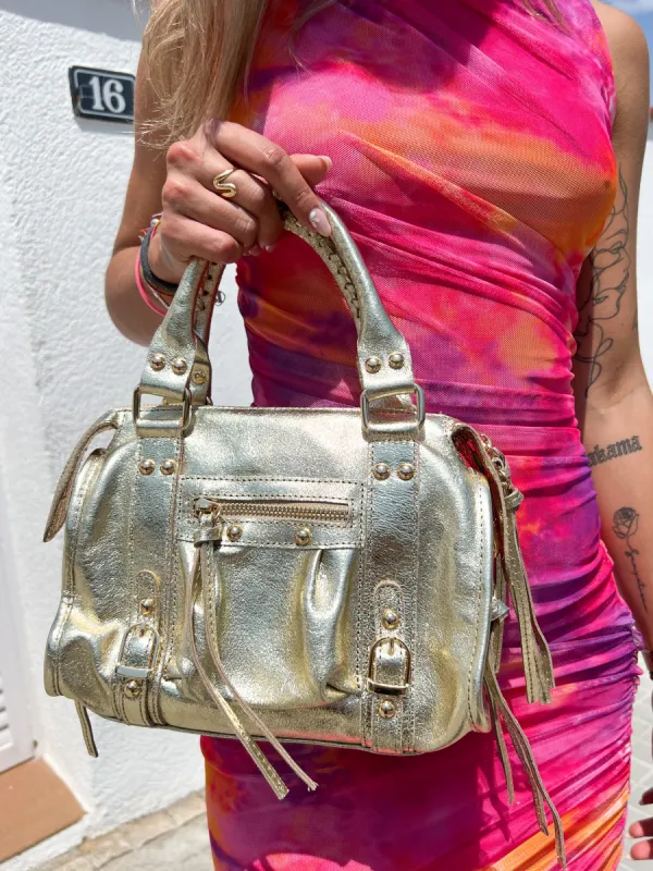 Bolso hebillas piel brillos dorado sold by Sorellas