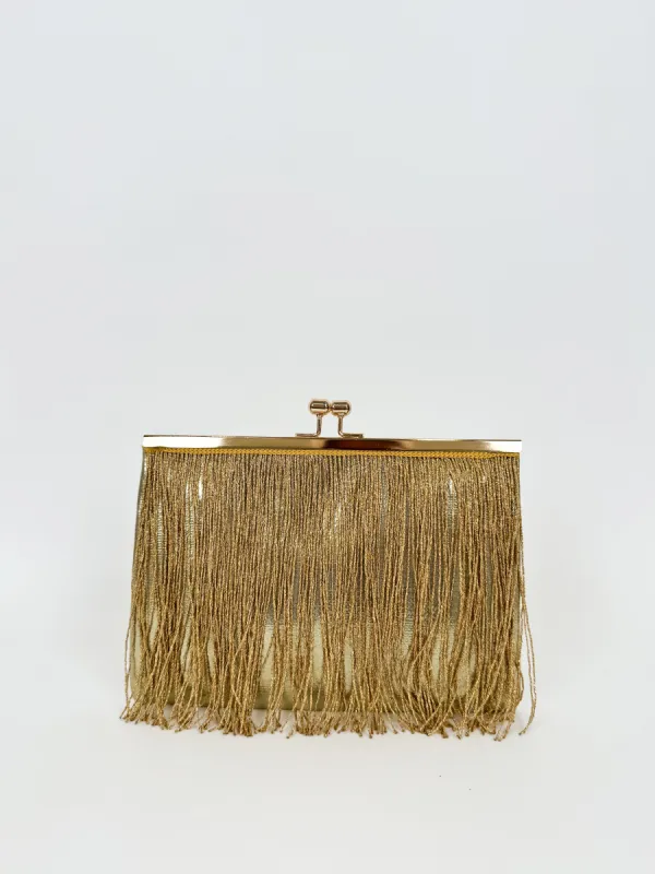 Clutch flecos dorado sold by Sorellas