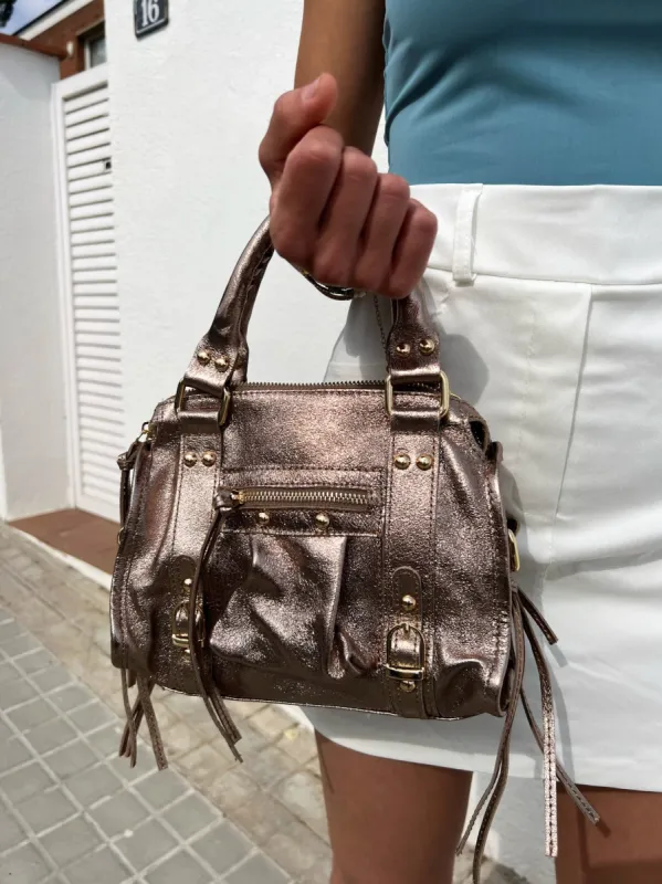 Bolso hebillas piel brillos bronce sold by Sorellas