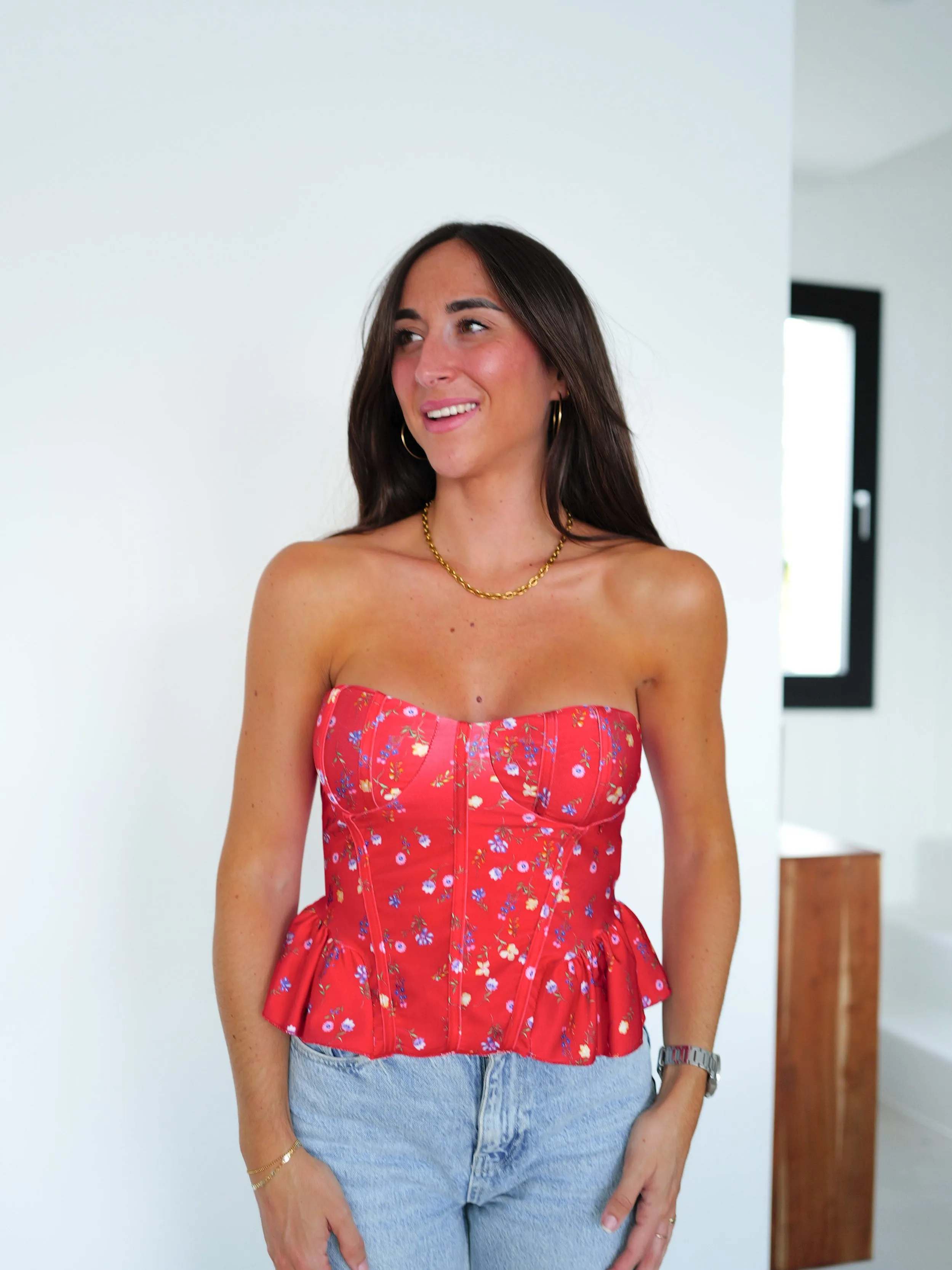 Top corsé volantes rojo sold by Sorellas