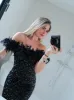 Vestido mini plumas glitter negro sold by Sorellas