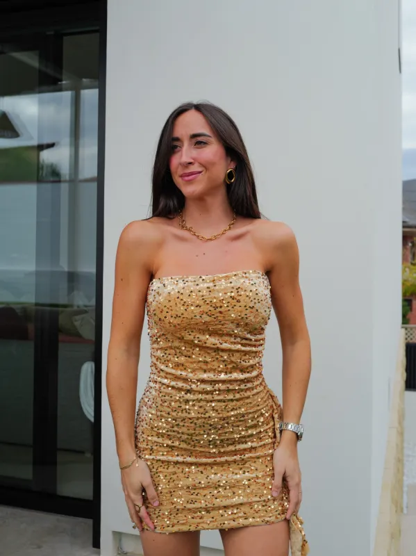 Vestido glitter volante velvet dorado sold by Sorellas
