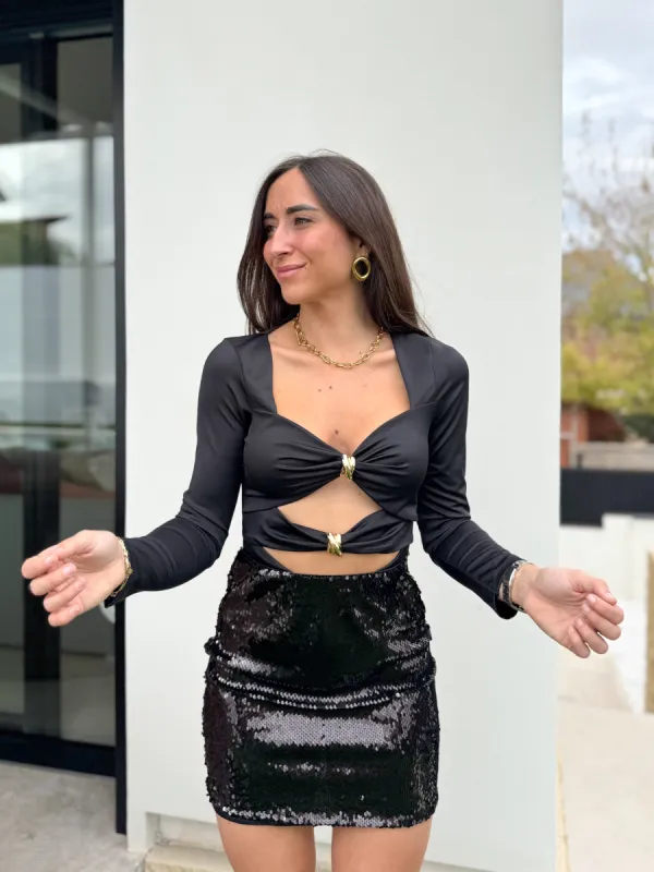 Falda mini glitter negro sold by Sorellas