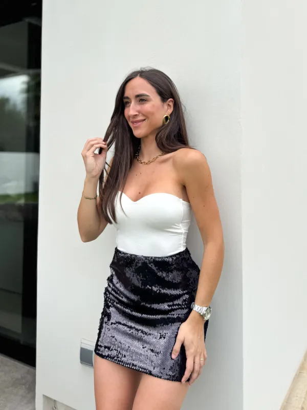 Falda mini glitter marino sold by Sorellas