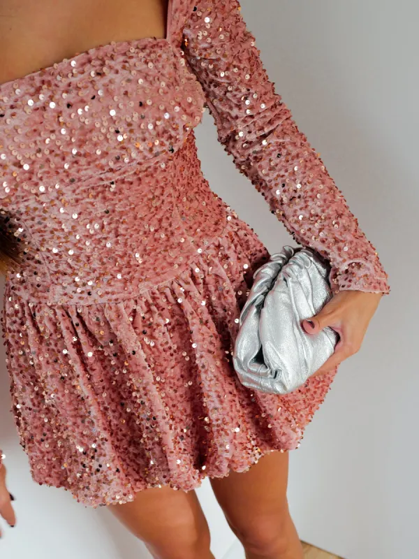 Clutch piel bombonera plateado sold by Sorellas