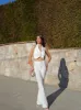 Conjunto largo botones blanco sold by Sorellas