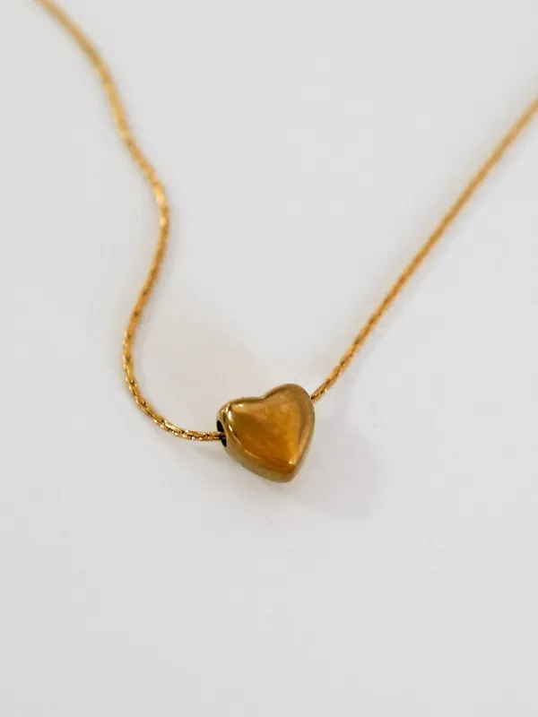 Colgante corazón dorado sold by Sorellas