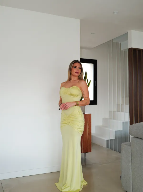 Vestido largo frunce amarillo sold by Sorellas