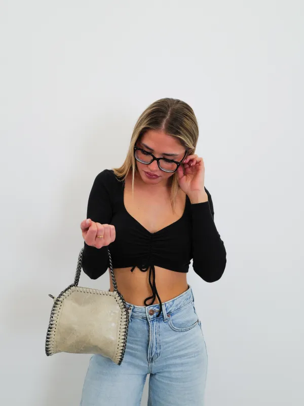 Bolso pocket bag brillo crema sold by Sorellas