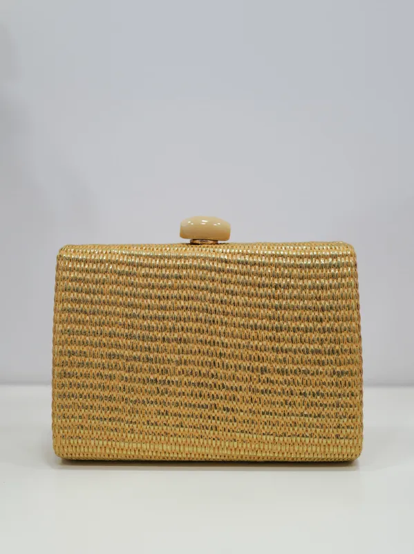 Clutch rafia dorado sold by Sorellas