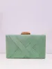 Clutch trenzado menta sold by Sorellas