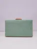 Clutch trenzado menta sold by Sorellas