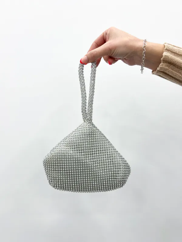 Clutch pocket brillos plata sold by Sorellas