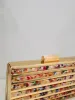 Clutch bandas colores dorado sold by Sorellas