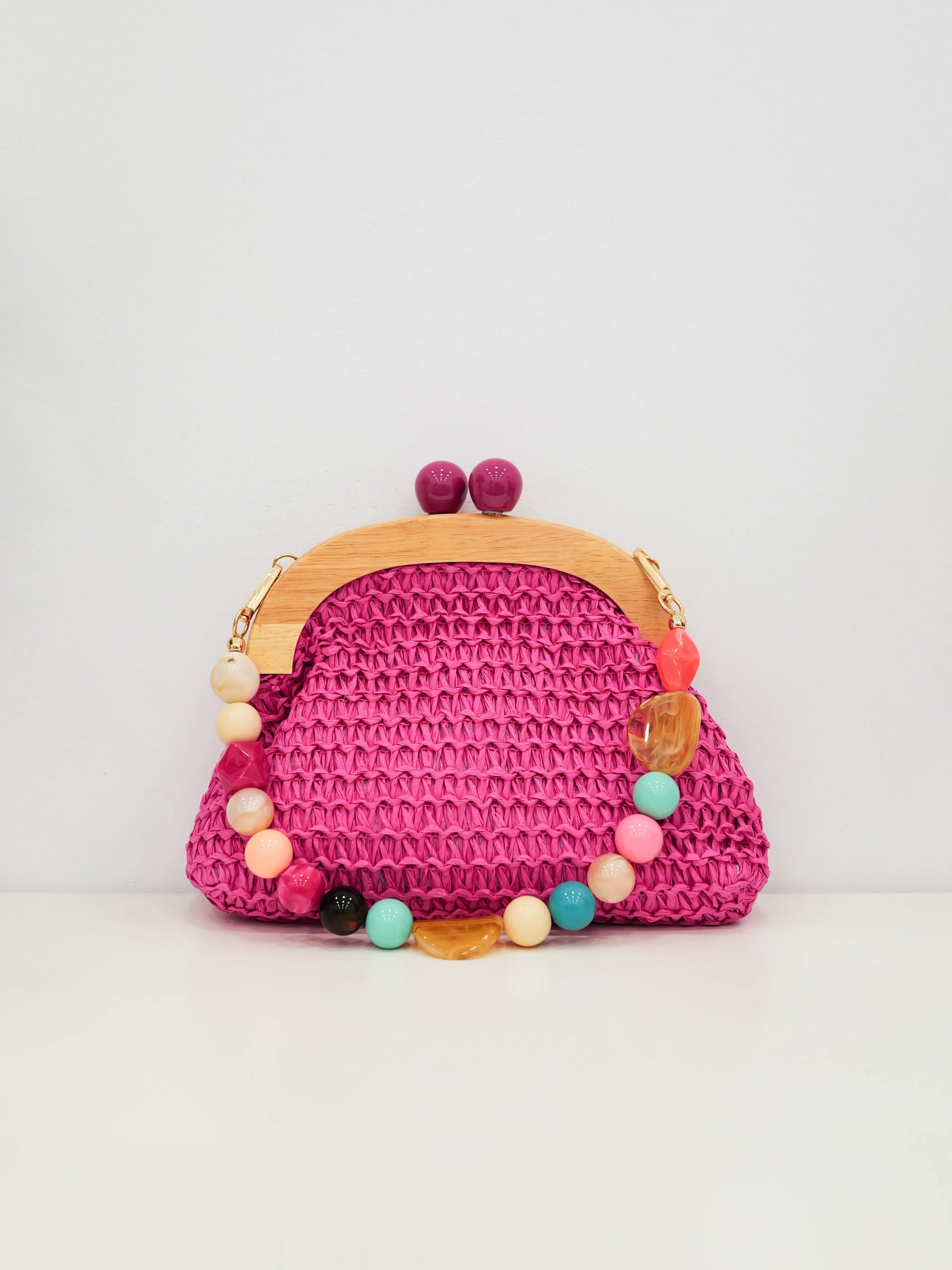 Clutch rafia abalorios fucsia sold by Sorellas