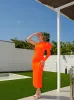 Vestido midi asim manga abullonada naranja sold by Sorellas