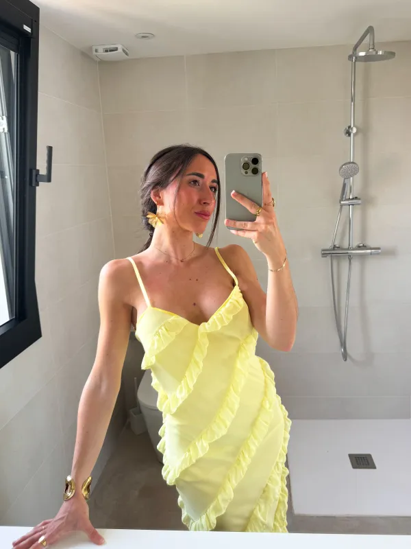 Vestido volantes crepe amarillo sold by Sorellas
