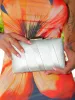 Clutch bandas textura plata sold by Sorellas