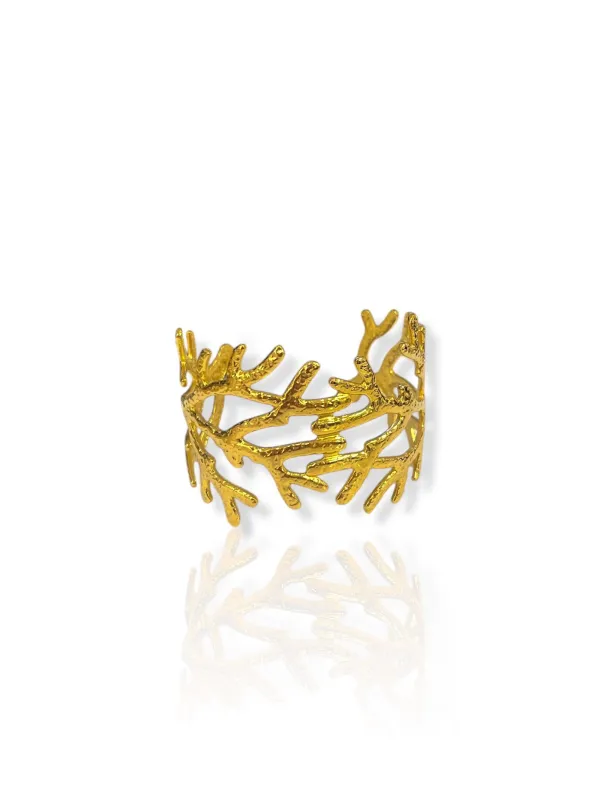 Brazalete corales dorado sold by Sorellas