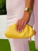 Clutch piel bombonera detalle amarillo sold by Sorellas
