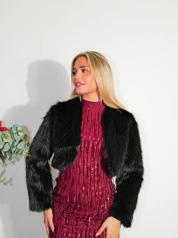 Chaqueta mini pelo negro sold by Sorellas