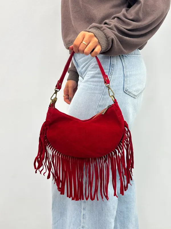 Bolso flecos piel rojo sold by Sorellas