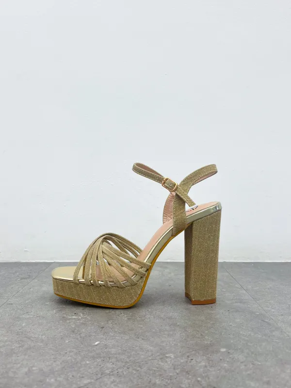 Sandalia entrelazado brillos dorado sold by Sorellas