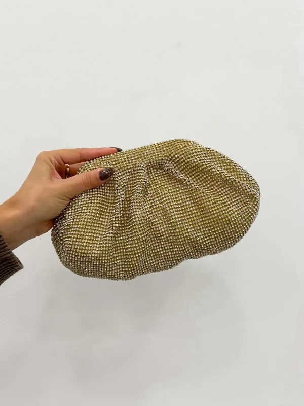 Clutch bombonera brillos dorado sold by Sorellas