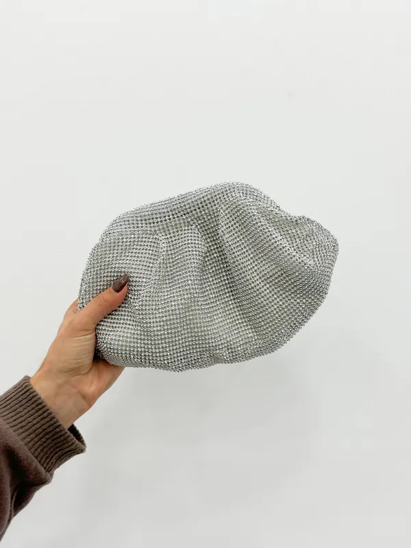 Clutch bombonera brillos plata sold by Sorellas