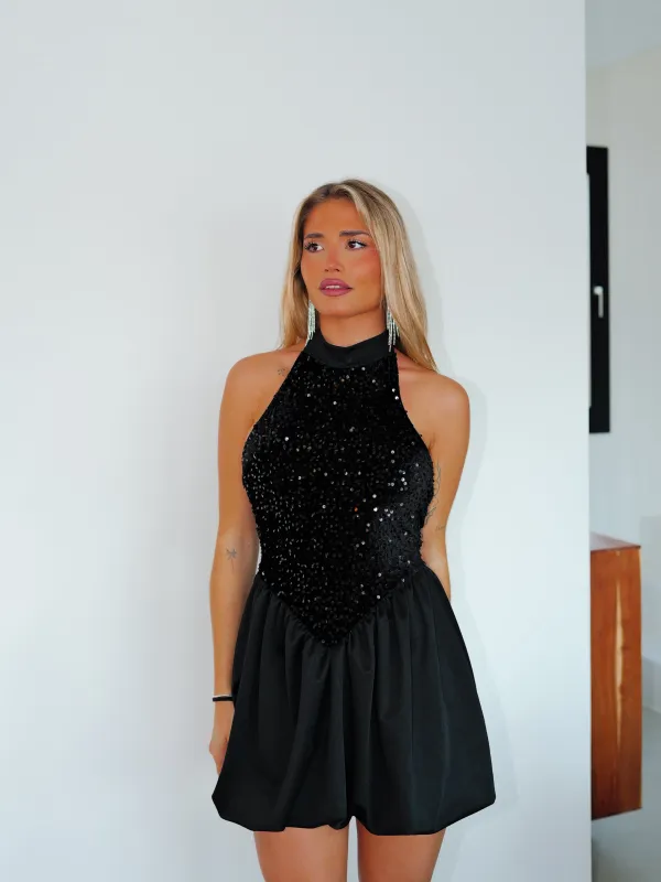 Vestido mini pomposo cuello halter negro sold by Sorellas