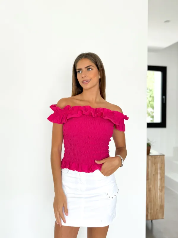 Top barco rizo fucsia sold by Sorellas