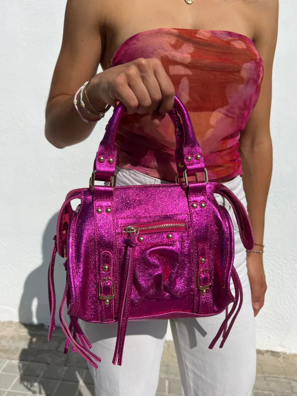 Bolso hebillas piel brillos fucsia sold by Sorellas