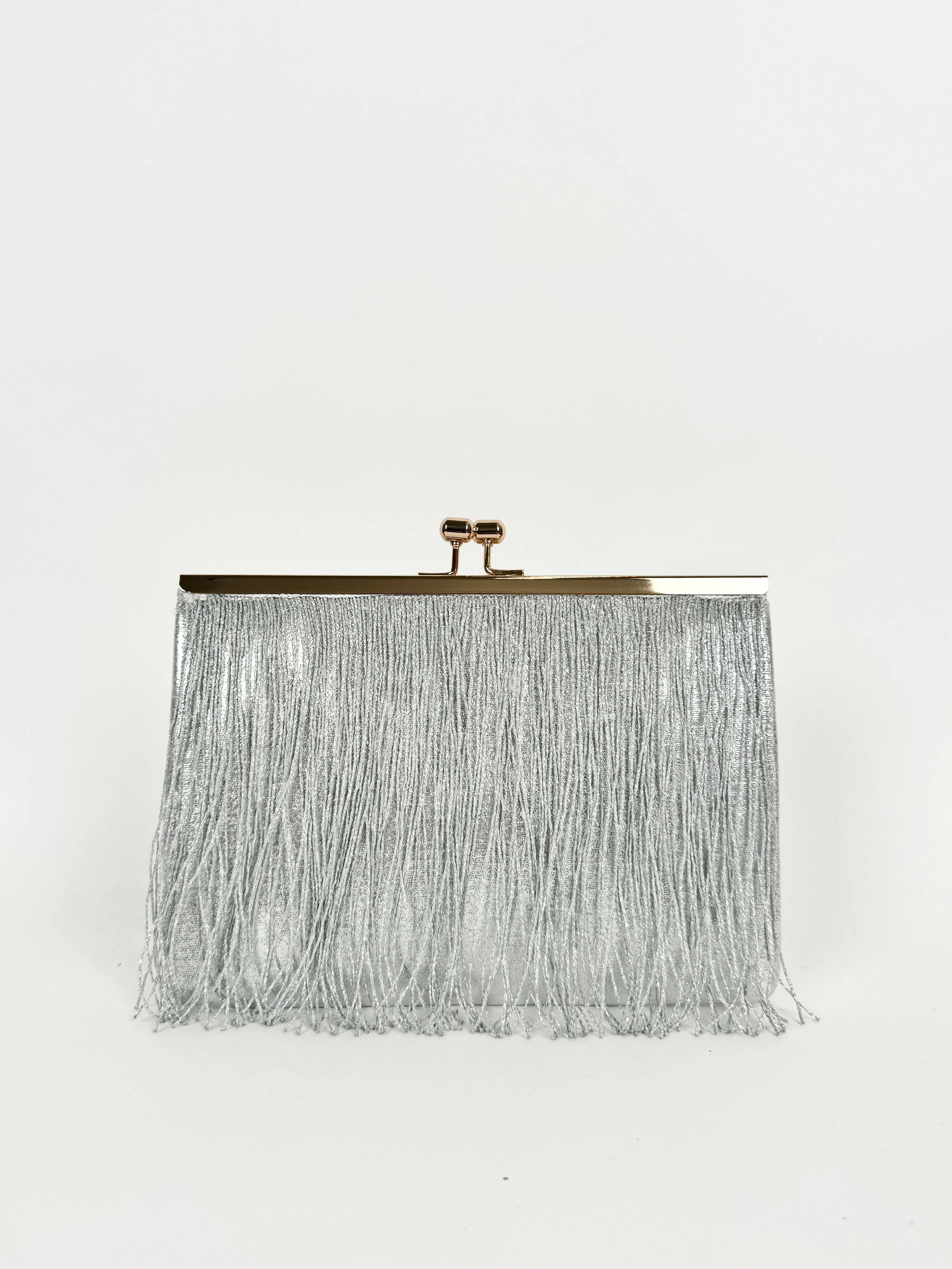 Clutch flecos plata sold by Sorellas