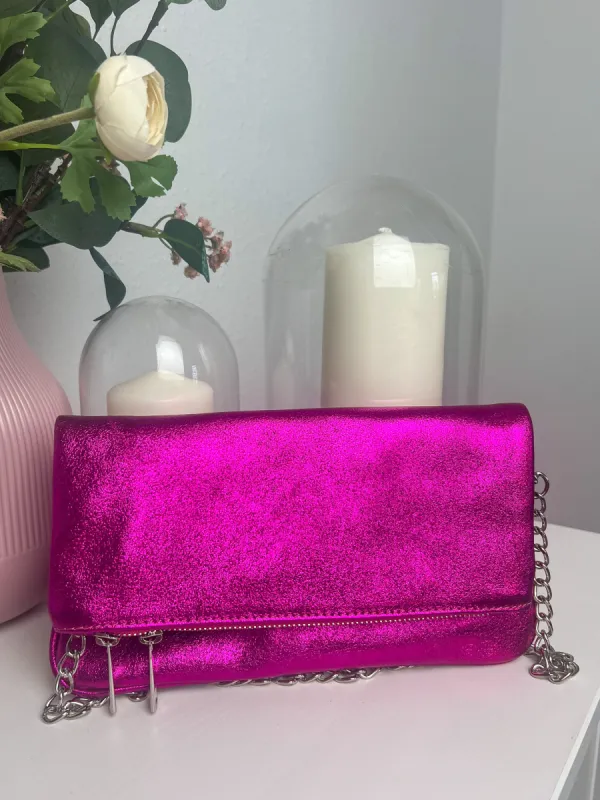 Bolso piel cadenas metalizado fucsia sold by Sorellas