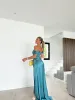 Vestido ballenas raso petróleo sold by Sorellas