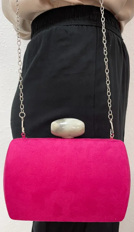 Clutch rosa ante piedra sold by Sorellas